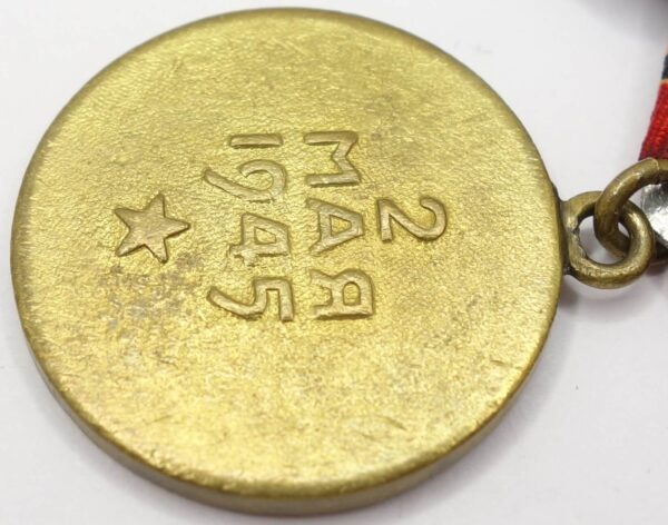 Group of Soviet medals consisting of a Medal for Bravery #2229571 and Medals for Prague, Berlin and Victory over Germany - Image 17