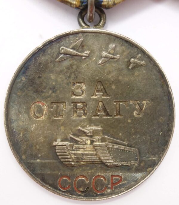 Group of Soviet medals consisting of a Medal for Bravery #1586881, Combat Merit #337207 and campaign medals - Image 6