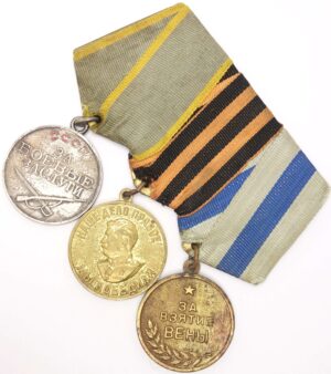 Group of Soviet medals consisting of a medal for Combat Merit